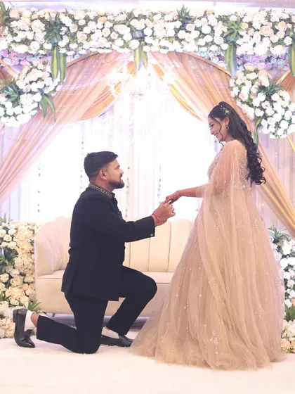 That magical moment. For this beautiful engagement, we created a soft, romantic makeup look and flowing curls to complement her fairy-tale gown, ensuring she looked and felt like a princess.
