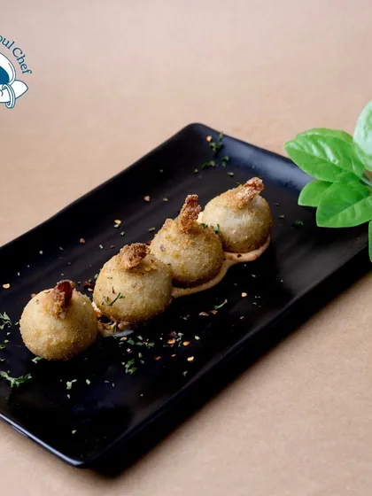 These Stuffed Cheese Prawn Balls are pure indulgence. Succulent prawns are mixed with cheese, coated in a crispy layer, and fried to golden perfection, creating a bite that is bursting with flavor.