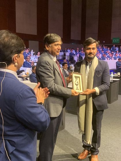 Receiving a memento after my performance for HPCL. These moments of recognition inspire me to continue pushing the boundaries of my storytelling.