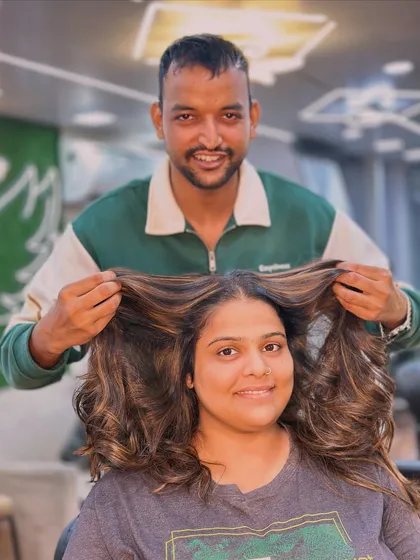 Another happy client with her stylist. We love capturing these moments of joy when a client sees their new hair for the first time.