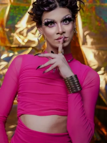 This pose is all about attitude, a crucial element of any drag performance.