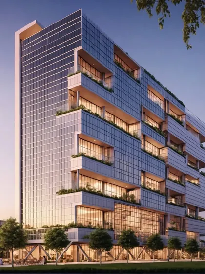 A render of the lake-view commercial building at sunset. The stepped-back green terraces are clearly visible, showcasing how biophilic design is integrated into the building's form to enhance the workplace environment.