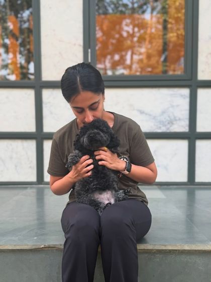 Cuddling with tiny Mango. We are absolutely mutts about her!