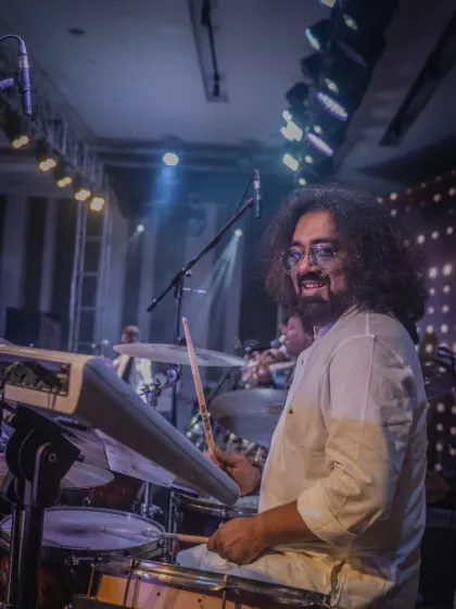 A candid shot of our drummer enjoying the performance at Taj Vivanta.