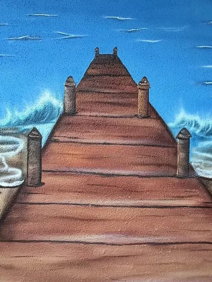 A section of the mural showing the wooden pier and the waves.