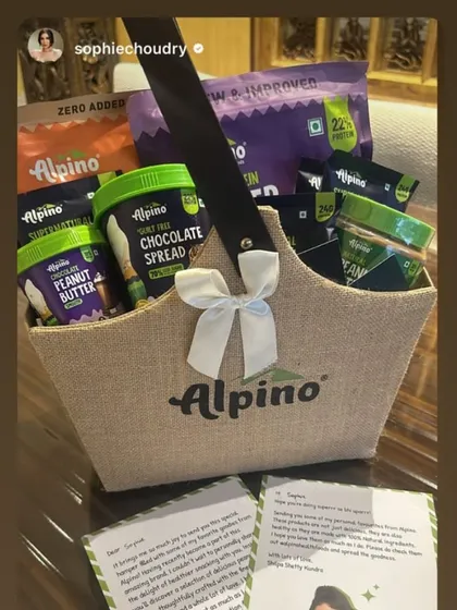 A beautiful shot of the finished Alpino health foods hamper, as shared by Sophie Choudry. The custom-branded jute bag was filled with their range of healthy peanut butter and protein products.