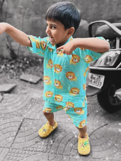 Another pop of color! This lion print co-ord set is so vibrant and fun. The bright aqua and yellow are sure to stand out on the playground.