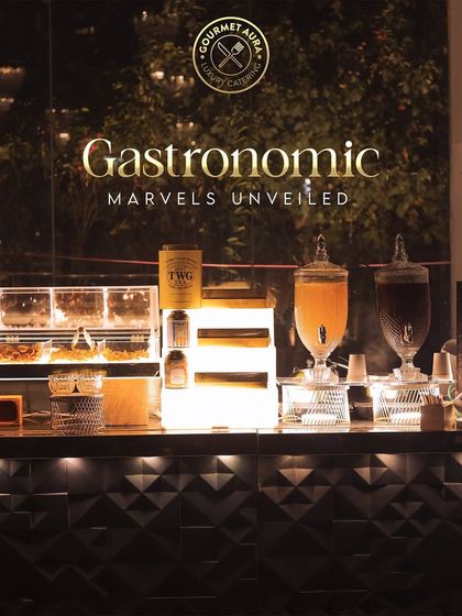 Our "Gastronomic Marvels Unveiled" beverage station, featuring artisanal teas and infused drinks.