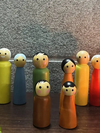A closer look at the peg dolls used in my sessions. Each one holds a place in the family system. My journey as a practitioner began as a client, so I have a deep, personal understanding of how this process can help you find your rightful place and let love flow freely.