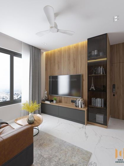 Another angle of the TV unit, showing the natural light from the large window.