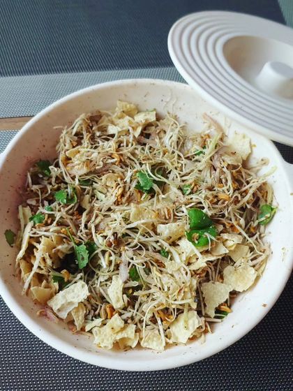 For those who love spicy salads, this is Manipuri Singju. It's a mix of finely chopped vegetables, herbs, and roasted powders, with a fiery kick from the chillies.