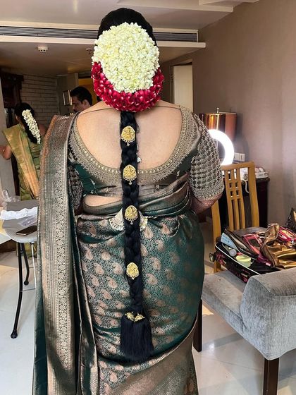 Mallipu for the Kerala bride. A South Indian bride is incomplete without loads of flowers, and this beautiful floral braid is a perfect example.
