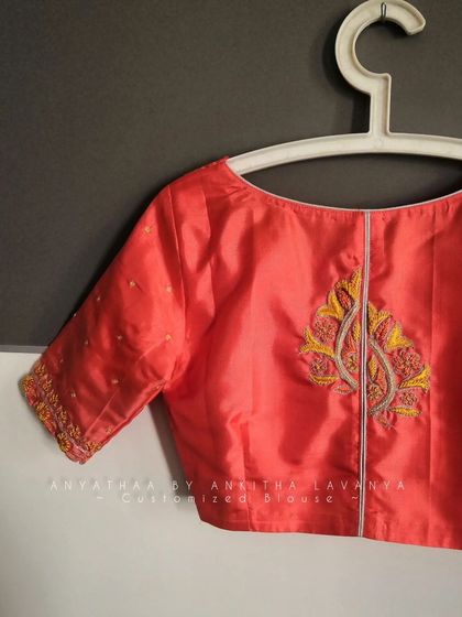 Another angle of the custom embroidered blouse, showing the fit and sleeve detail.