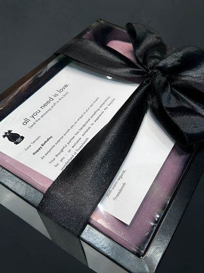 A beautifully packaged gift set, perfect for the groom. It's a way to make his special day even more memorable with a touch of bespoke luxury.