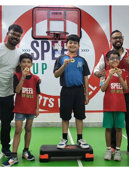 Posing with the winners. It's a proud moment for both the kids and the coaches who have trained them.
