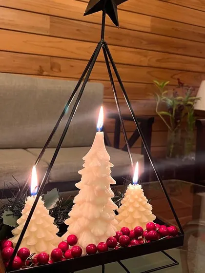 Another happy client photo, this time of my metal tree stand with three white tree candles, creating a cozy and magical atmosphere.