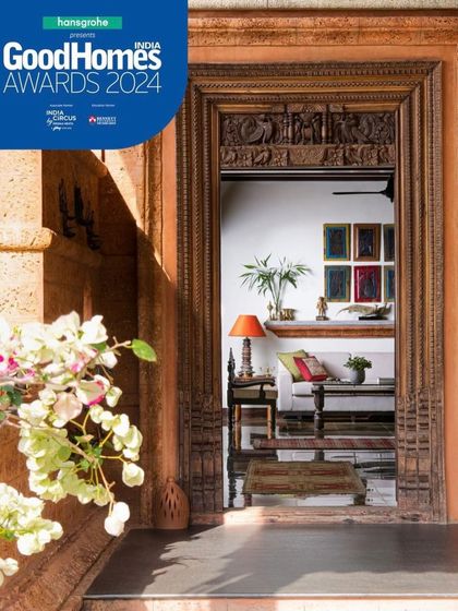 This home, which recently received the GoodHomes 2024 Award for contextual design, grew from a deep reverence for its Coorg setting. The antique doorway is a testament to this, framing the life within.