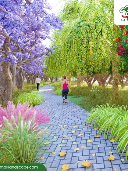 A rendering of a park with a paved jogging path lined with a vibrant mix of flowering and weeping trees. This design promotes an active lifestyle while immersing users in a beautiful, colorful, and naturalistic setting.