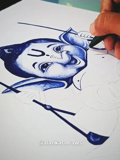 A close-up of the Ganpati Bappa pen sketch in progress. I use a simple blue pen to create different shades and textures.