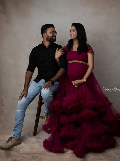 A modern and stylish couple's portrait. Her glamorous gown and his casual-cool look create a wonderful contrast.