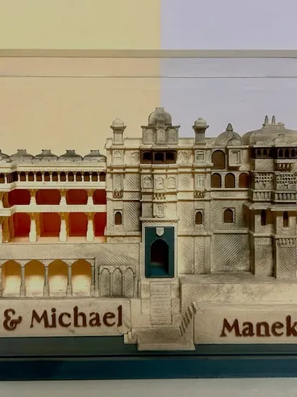 The magic is in the details that guests take home. For a wedding at Manek Chowk, I commissioned this bespoke 3D model of the palace as a keepsake, a tangible piece of the couple's royal celebration.