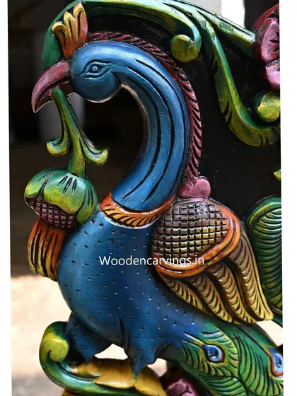 A detailed close-up of the peacock's head, where the fine brushstrokes are clearly visible.