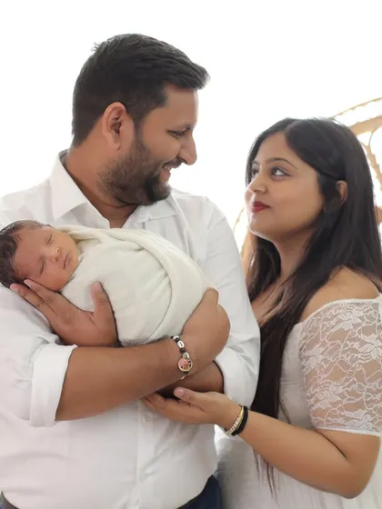 Your first family portrait. In the midst of all the changes, we pause to capture the three of you together, creating a memory of where your new chapter as a family began.