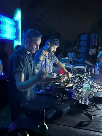 A candid moment, sharing the decks and the vibe with Manu Ferrantini. These collaborations are what the scene is all about.