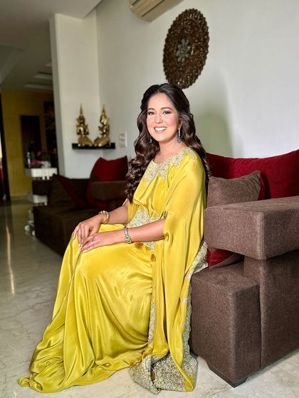 A full view of the half-pinup hairstyle, perfect for showing off both your hair and your outfit.