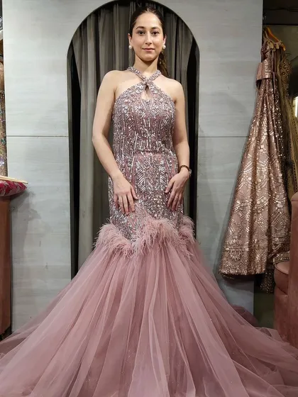 A third option for this client, a dusty pink halter-neck gown with feather details. It's always great to have choices.
