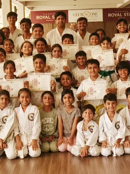 Our community is our strength. This is a proud moment from our Virar branch's belt and certificate distribution, celebrating the progress of dozens of students. From the youngest white belts to advanced practitioners, we grow together as a team.