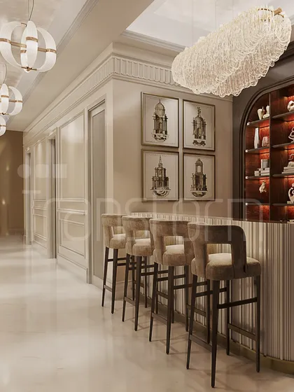 This shot captures the timeless opulence of the bar area, with its elegant lighting, rich materials, and connection to the adjacent hallway and staircase.
