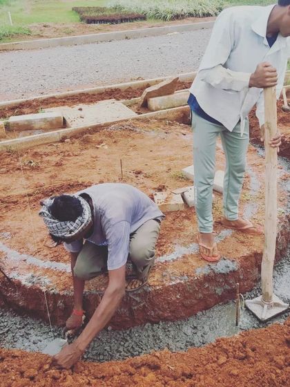 Materializing curves from drawings to the site is an exciting process. Here, workers are laying the foundation for a curved pathway in a community park, bringing the fluid lines of the design to life.