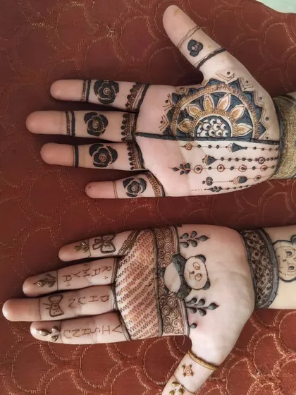 A cute and fun Diwali mehndi for a young client. The design includes a sun motif and a little teddy bear, making it playful and unique.