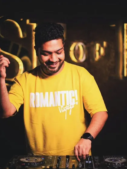 A playful moment during my set. I always have fun on the decks, and that energy translates directly to the dance floor.