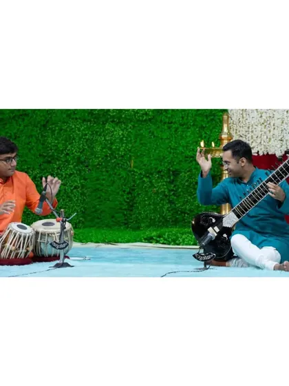 A moment of musical dialogue with the tabla player during a concert in Kerala. The interplay between sitar and tabla is a key feature of my traditional performances.