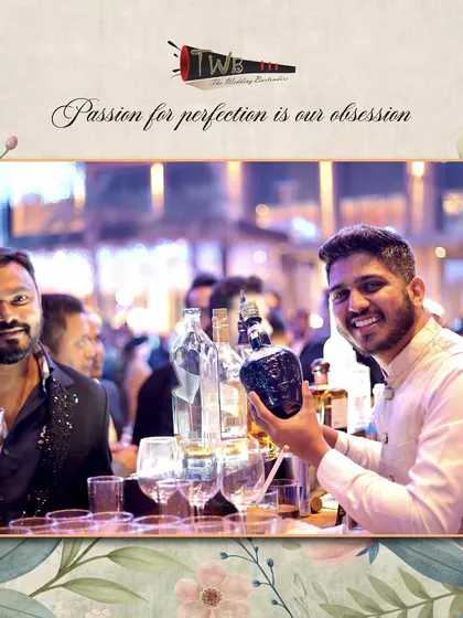 A guest and bartender share a moment at the bar, highlighting the interactive and engaging experience we strive to create.