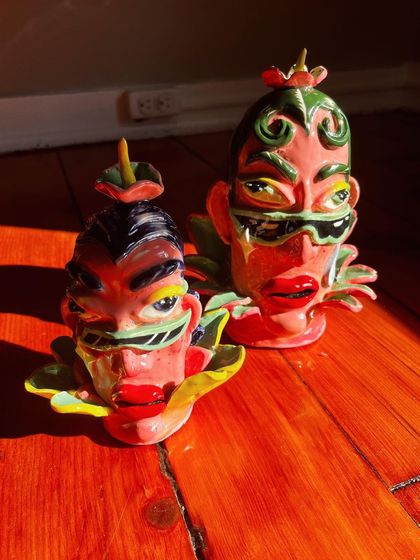 'Glazed & Confused,' a pair of silly, sassy ceramic flower heads I created during my first ceramics workshop.