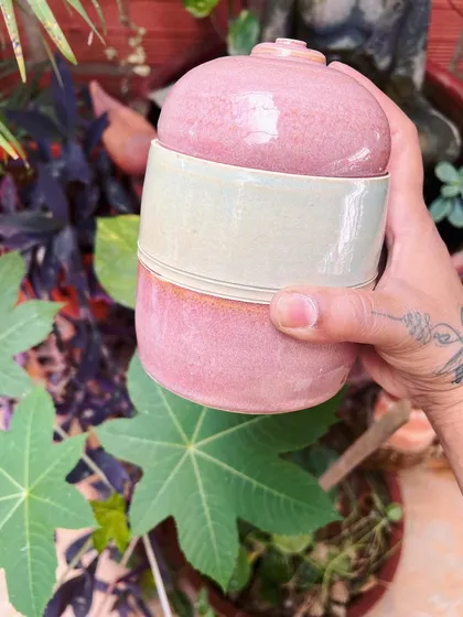 A two-toned pink and cream jar. These pieces are available for purchase if you'd like to take a piece of my studio home with you.
