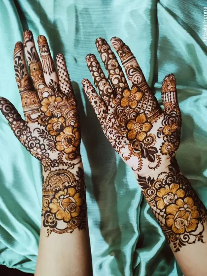 A full view of a beautiful floral design with different patterns on each hand.