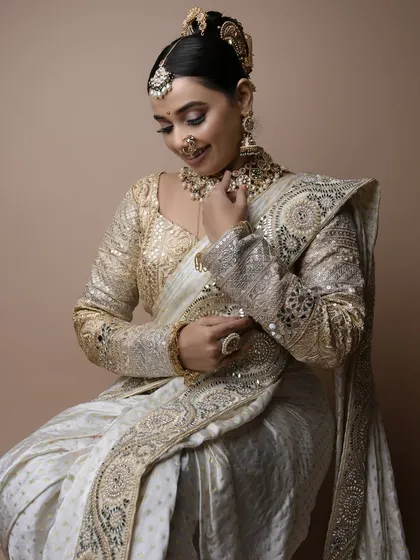 The complete look created by my student, showcasing the beautifully draped saree and the confidence of the model. This is the quality of work you will learn to produce.