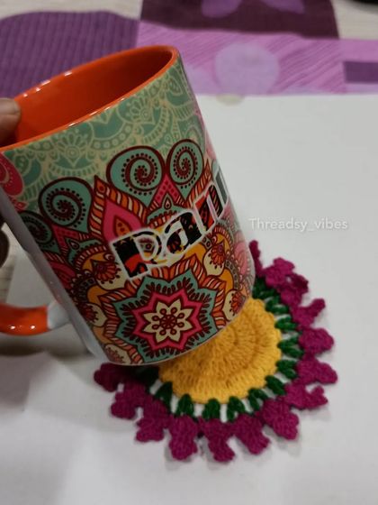 Here is another angle of my multi-colored crochet coaster, showing how it adds a vibrant, handmade feel to your everyday items.