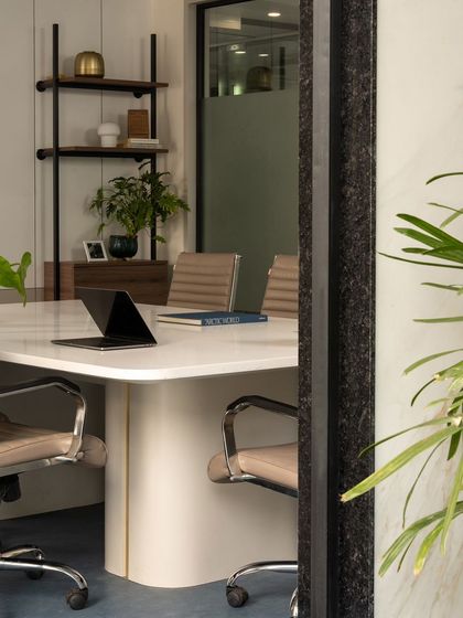 A duplicate of image 34, reinforcing the layered and textured view into the conference room.