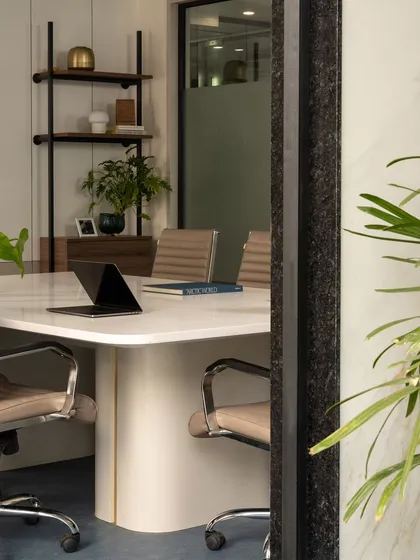 A duplicate of image 34, reinforcing the layered and textured view into the conference room.