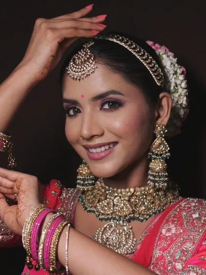 A vibrant pink bridal look from one of my seminars, featuring shimmery pink eyeshadow and a matching lip.