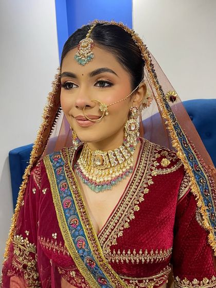 A beautiful portrait of the bride with her dupatta. You'll learn how to ensure the makeup looks perfect even when partially veiled.