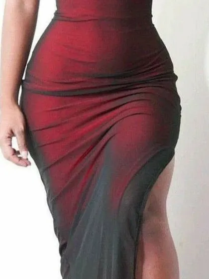 This detailed shot focuses on the draped fabric and side slit of the maroon gown, highlighting how it flatters the body's natural curves.
