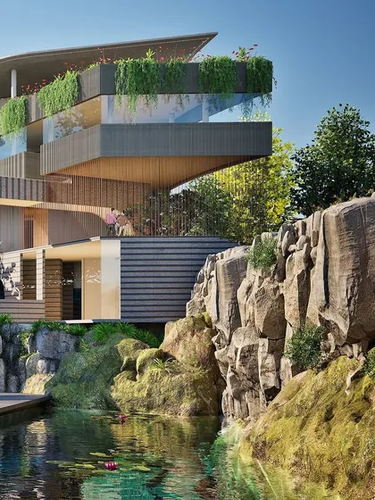 A design for a community clubhouse built into a retained stone quarry. This project demonstrates our ability to blend modern, sleek forms with raw, powerful nature. The structure emerges from the rock, creating leisure spaces that feel both man-made and elemental.