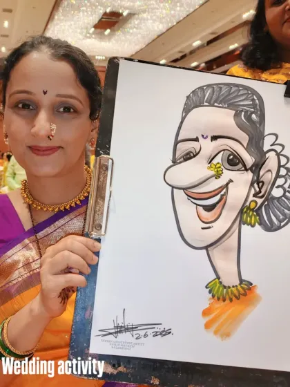 This caricature highlights the guest's traditional Maharashtrian nose ring and hairstyle, making it a culturally rich portrait.