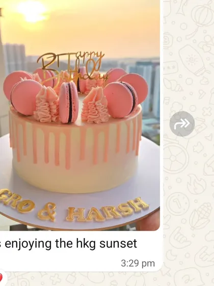 The client sent us this beautiful picture of the cake enjoying a Hong Kong sunset.